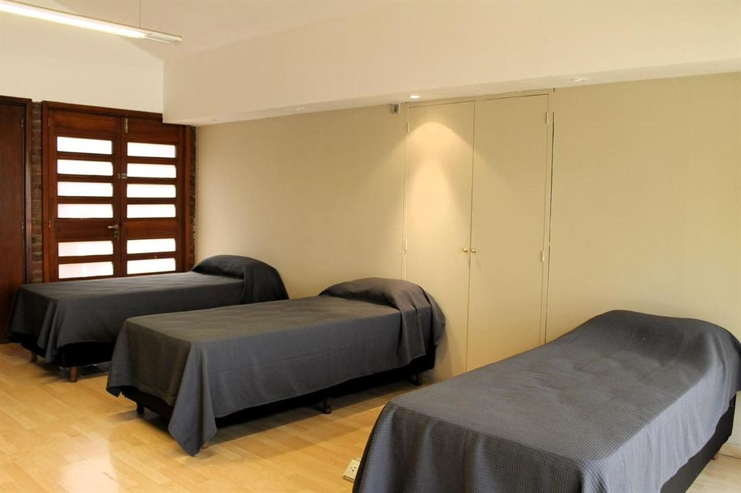 Dormitorio con baño